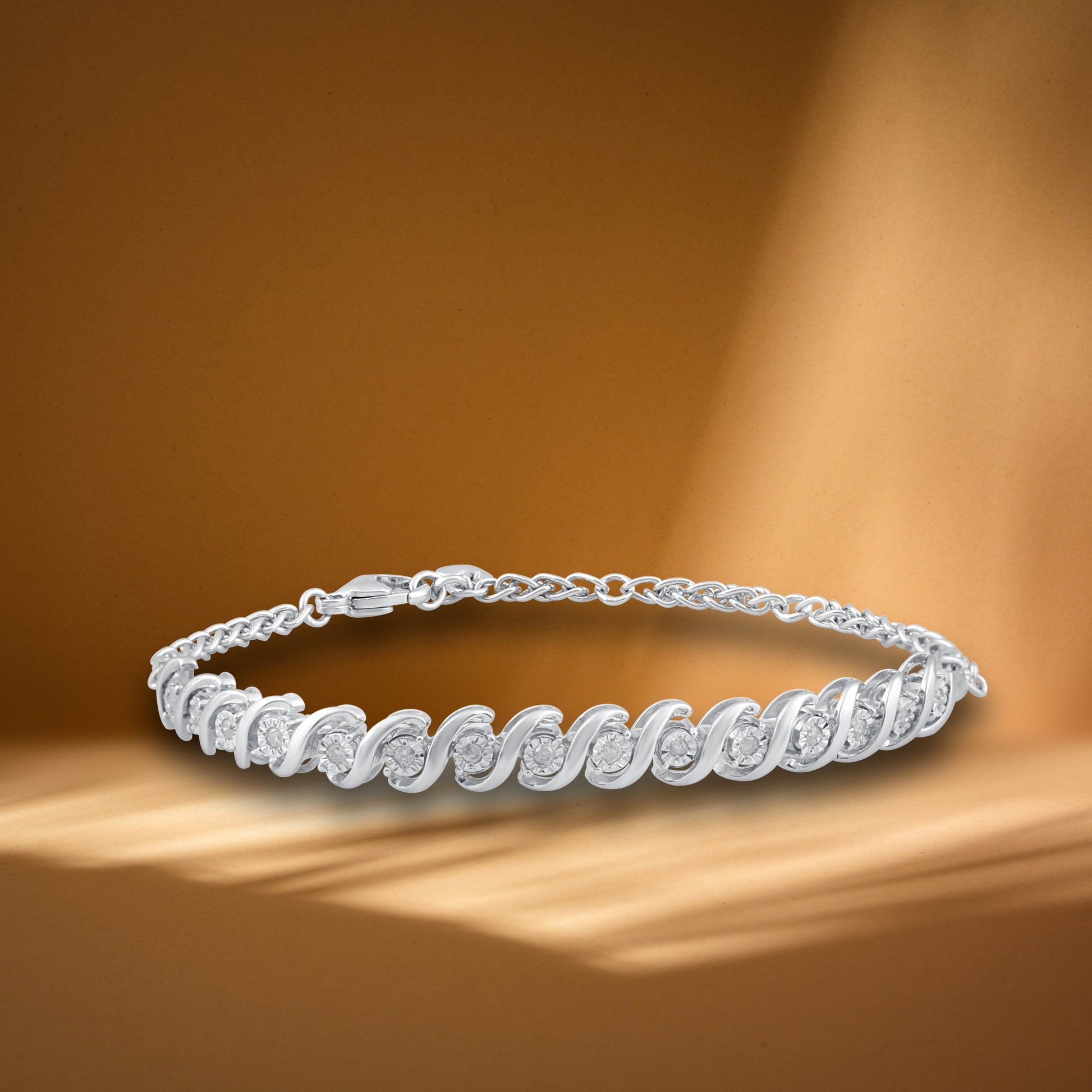 1/4 CTTW Diamond Women’S Swirl Link Tennis Bracelet .925 Sterling Silver